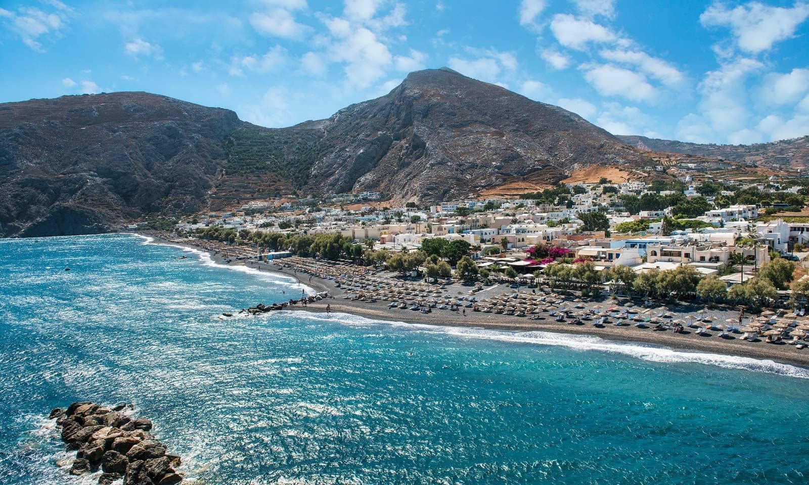 Kamari black sand beach aerial view, Santorini